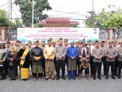 Kapolresta Pekanbaru Pimpin Apel Launching Penggunaan Tanjak dan Selempang Bersama LAM Riau