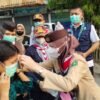 Ketua Kwarcab Pramuka Pekanbaru Bagikan Ribuan Masker Kepada Masyarakat